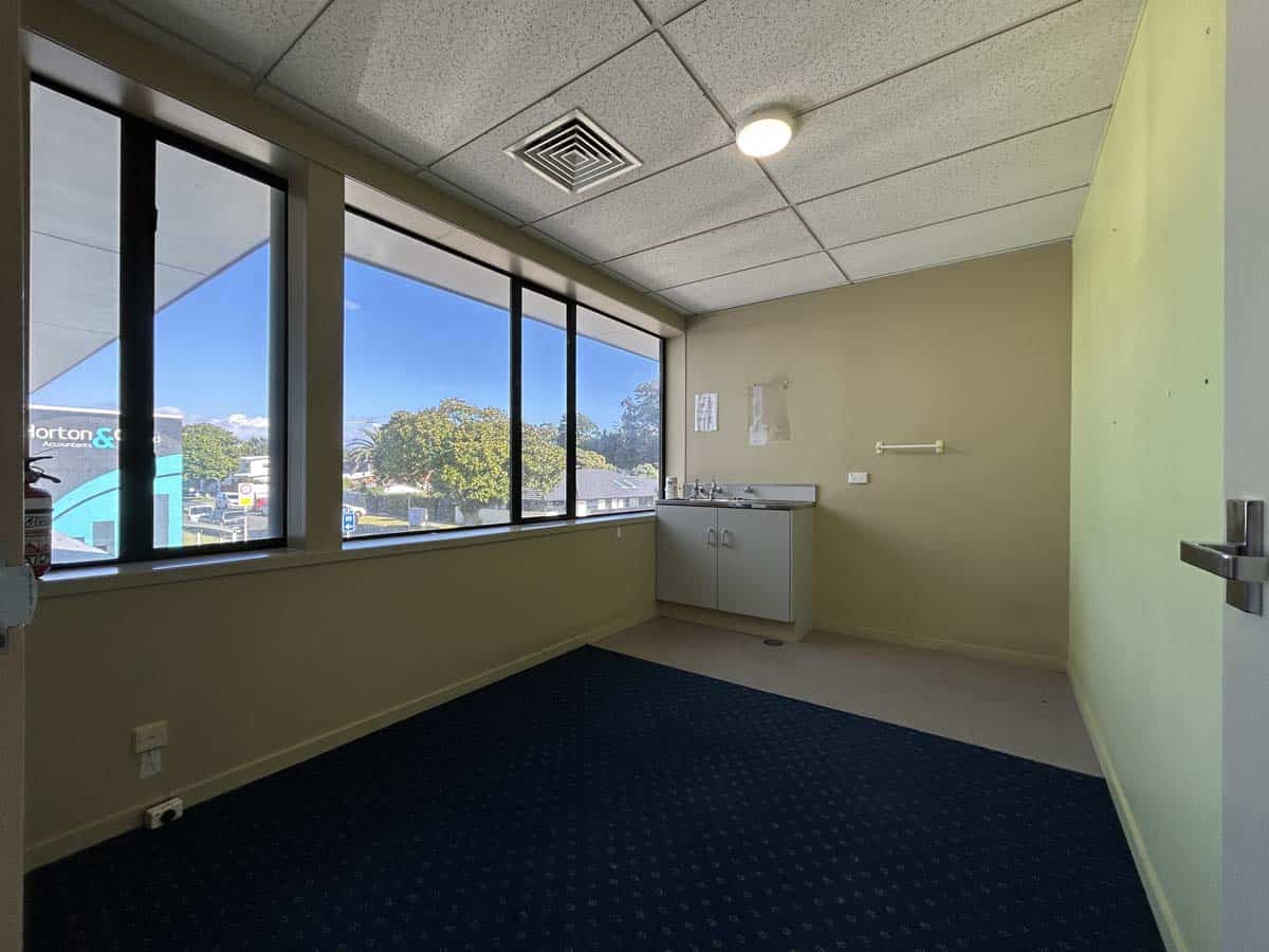 Office room with large windows and city view at 5 Clinton Street.