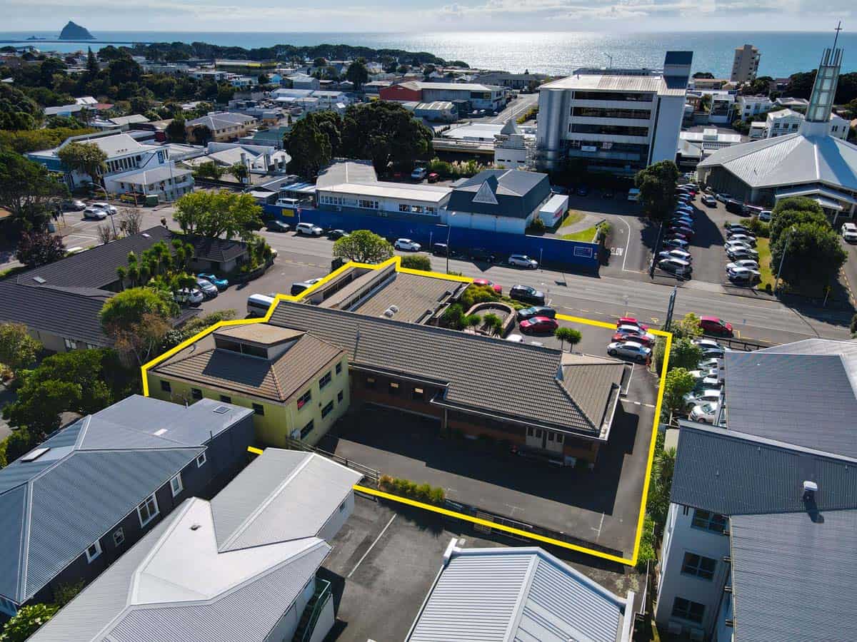 Aerial view of White Lion building at Powderham Business Centre, with surrounding offices and parkin.