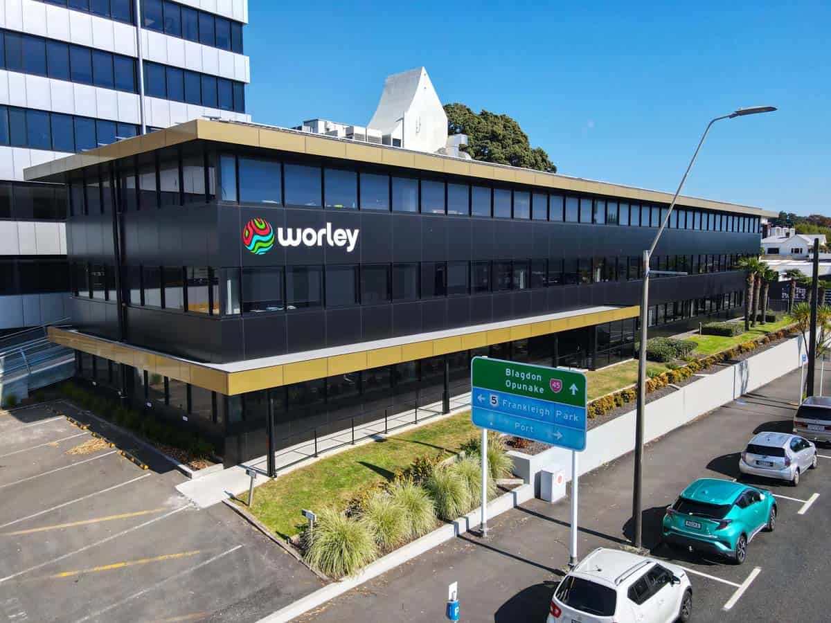 Modern Black Office Building with Worley and White Lion logos in Auckland.