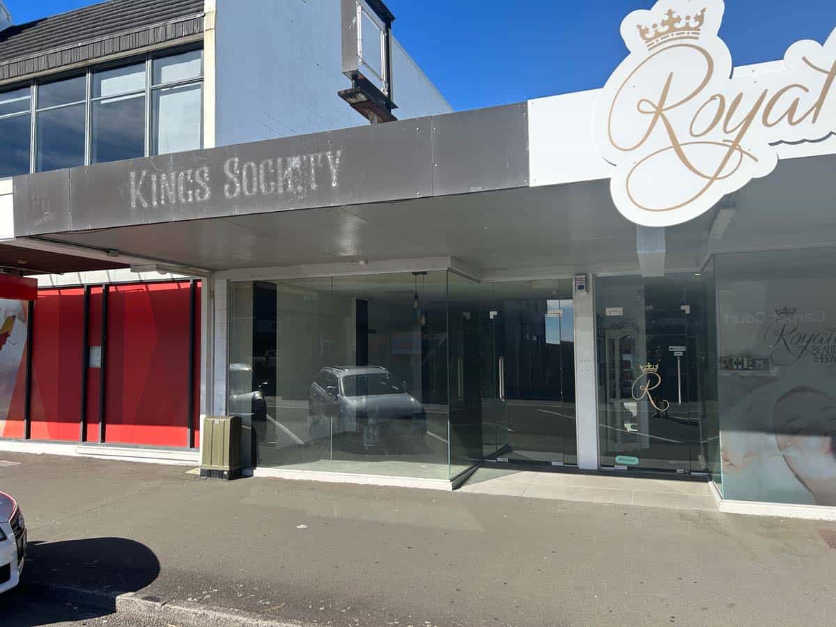 Modern White Lion store in Auckland with sleek glass facade and signage.