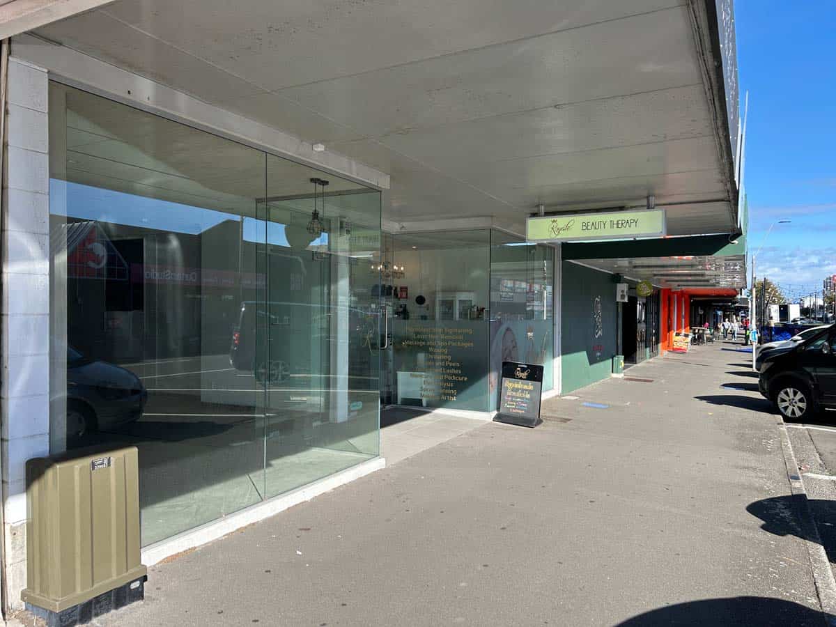 Exterior view of White Lion beauty salon on a sunny day.