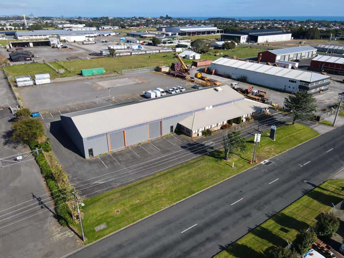 Aerial view of White Lion industrial warehouse with parking and surrounding infrastructure.