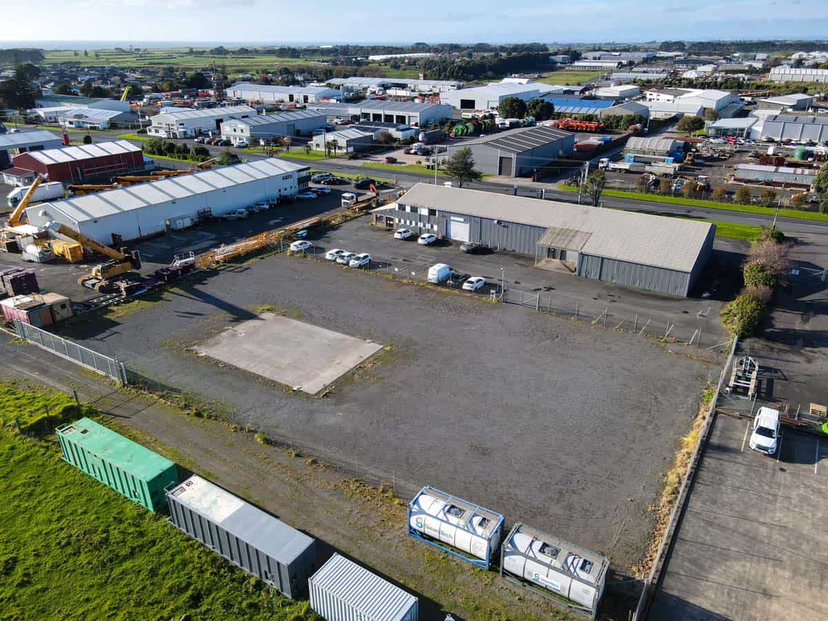 Industrial yard with warehouses and storage units at White Lion site.