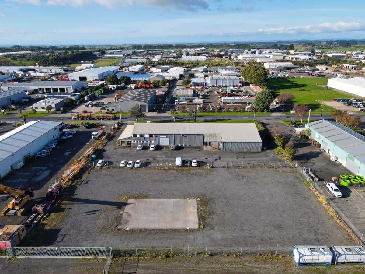 Aerial view of White Lion industrial park with warehouses and parking spaces in New Zealand.