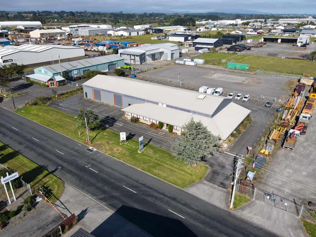 Aerial view of White Lion industrial warehouse with parking and surrounding storage units.