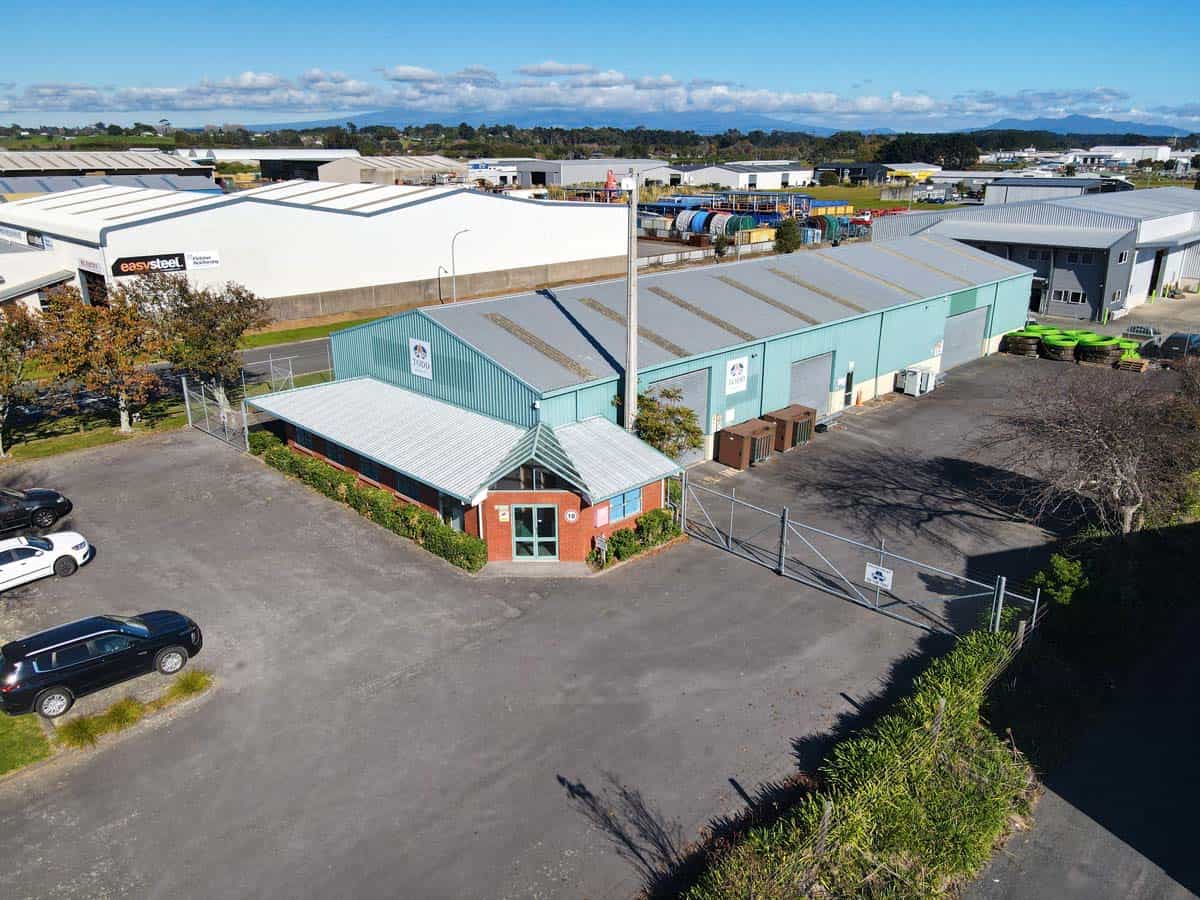 Aerial view of White Lion industrial warehouse with surrounding parking and storage facilities.