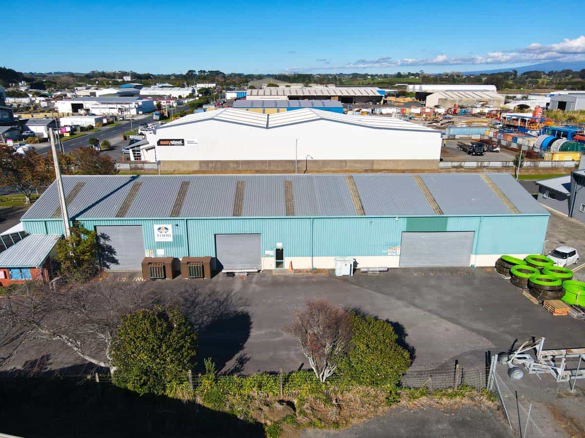 Aerial view of White Lion industrial warehouse with surrounding storage units and parking area.