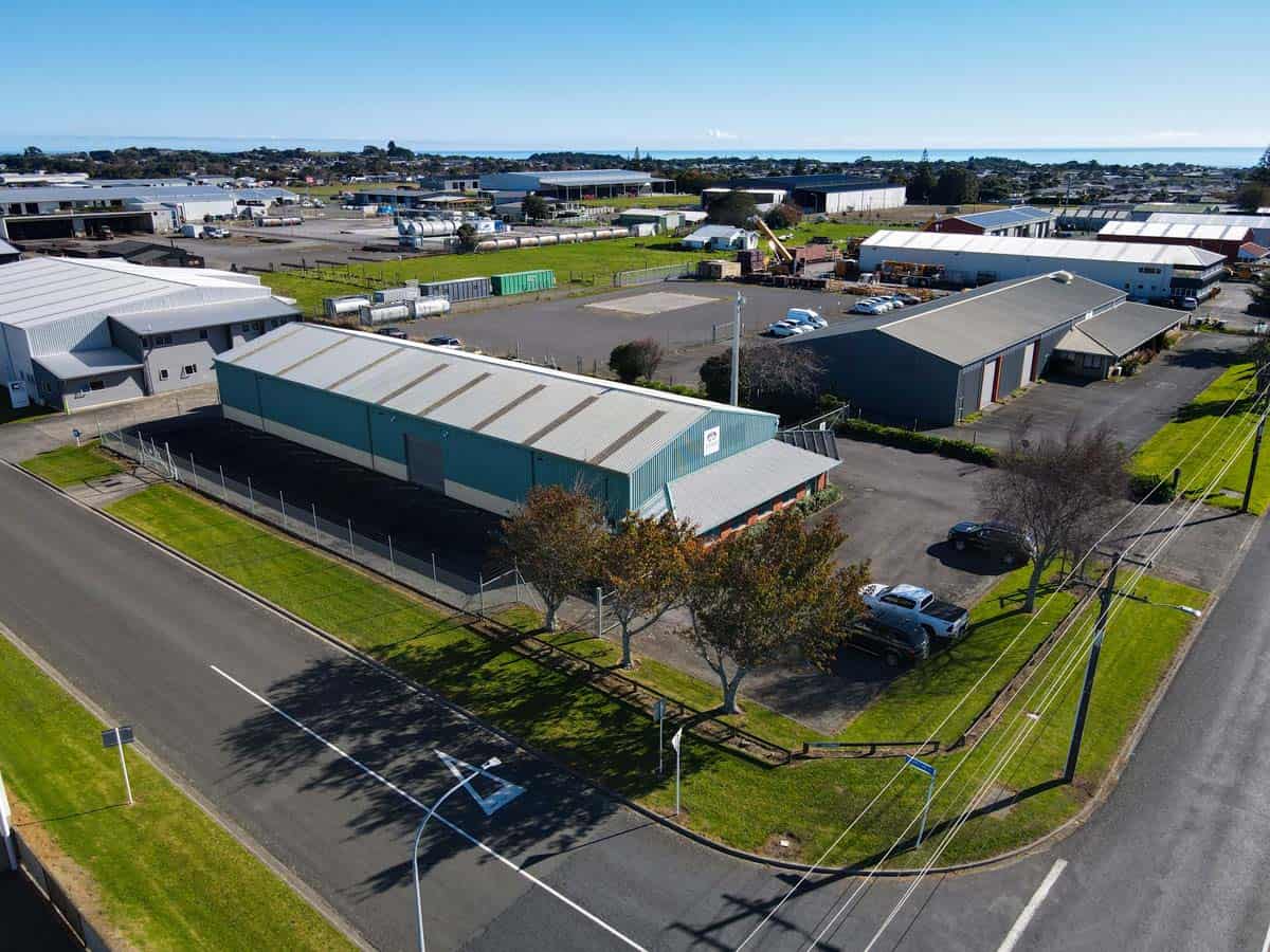 Aerial view of White Lion industrial warehouse complex with surrounding roads and parking areas.