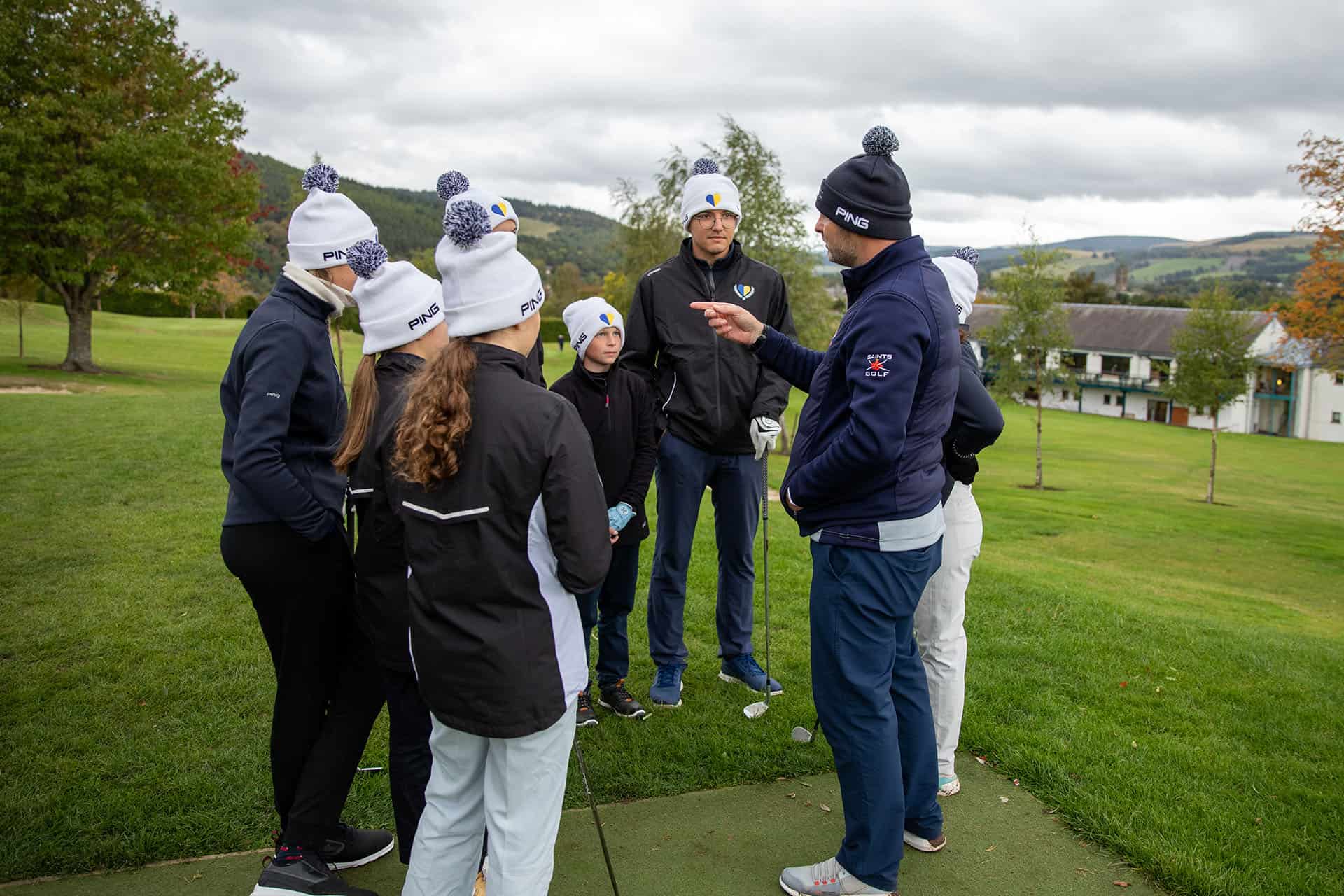 Project Ukraine participants listen to Ian Muir of St Andrews University works with particpants of Project Ukraine at Peebles Golf Club.