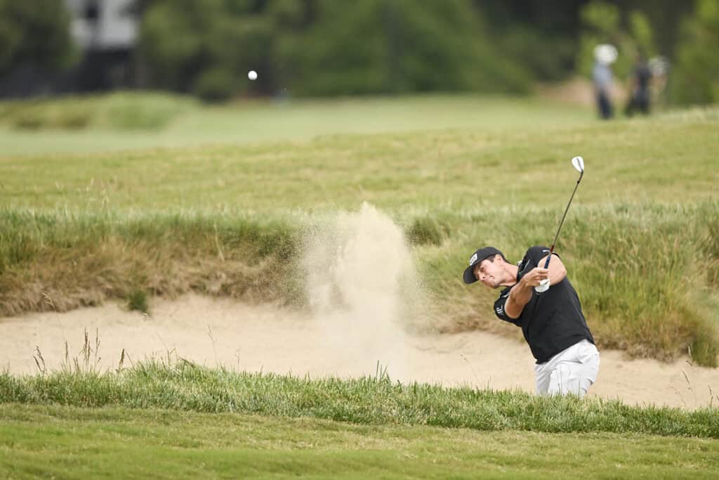 Viktor Hovland plays a bunker shot on the 10th hole during a practice round of the 2023 U.S. Open at The Los Angeles Country Club in Los Angeles, Calif. on Monday, June 12, 2023. (Robert Beck/USGA)