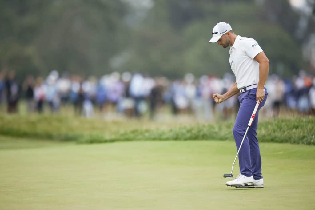 Wyndham Clark reacts after his final putt on the 18th green during the third round of the 2023 U.S. Open at The Los Angeles Country Club in Los Angeles, Calif. on Saturday, June 17, 2023. (James Gilbert/USGA)