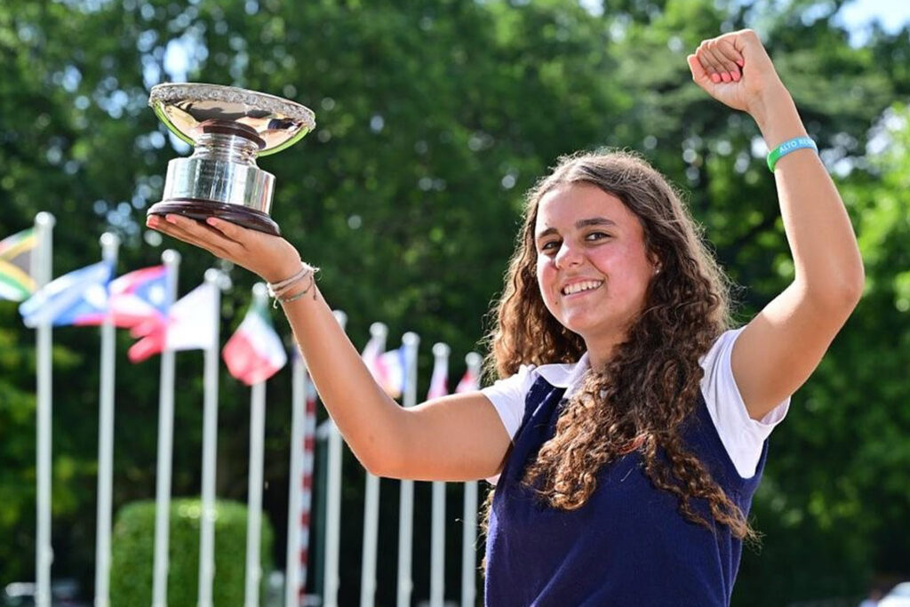 Spain's Adriana Garcia Terol lifts the English Girls' Under 14 Open Championship trophy