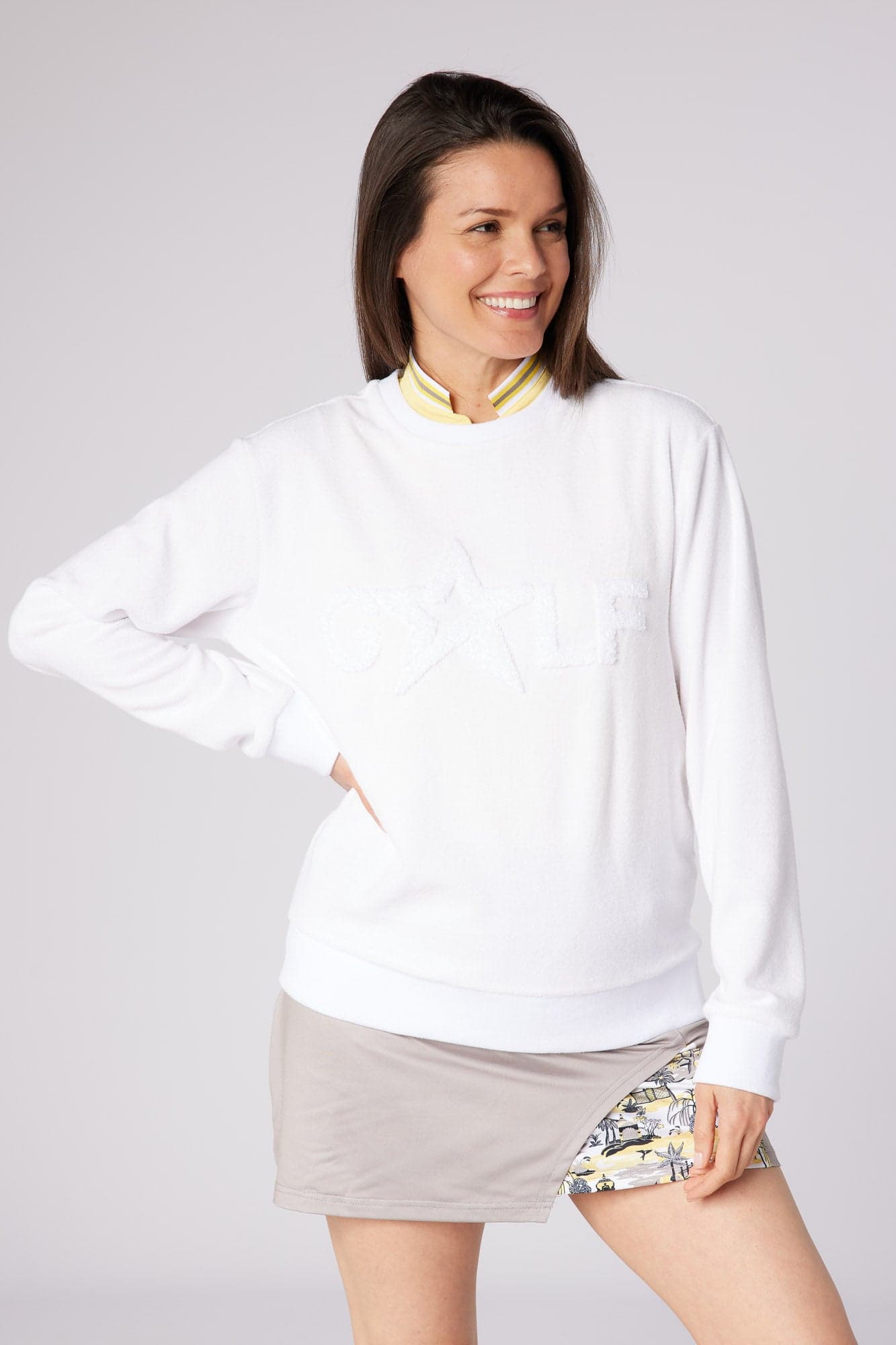 swing-out-sister-golf-elio-icon-sweater-white-1