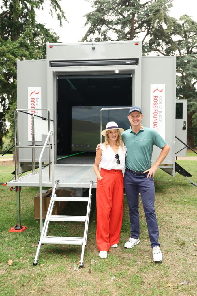 Kate and Justin Rose outside one of their trust vehicles