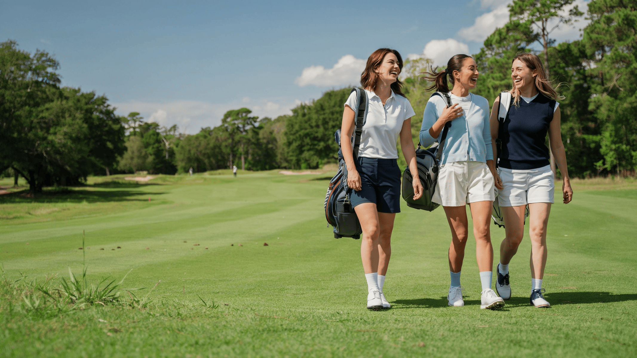 Three women golfer walking on a golf course