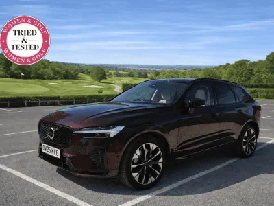 Volvo XC60 parked in a golf club car park, with the Women & Golf Tried & Tested logo attached