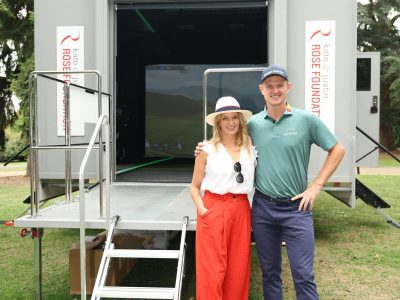 Kate and Justin Rose outside one of their trust vehicles
