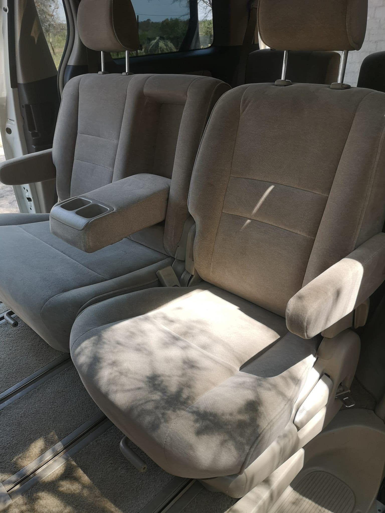 The back seats of a vehicle are empty.