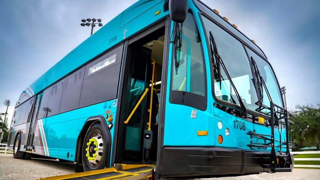 PalmTran bus stopping to pick up commuters