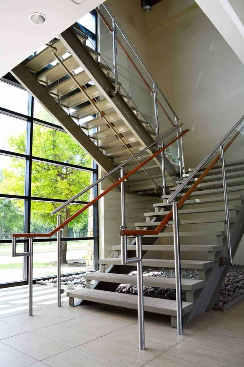 Modern interior staircase with glass railing