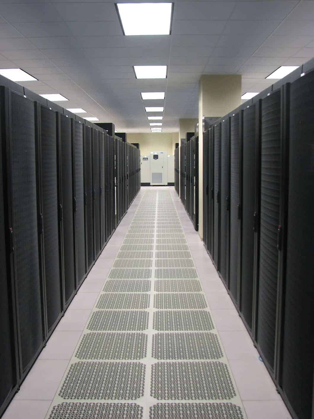 Server room with rows of black cabinets