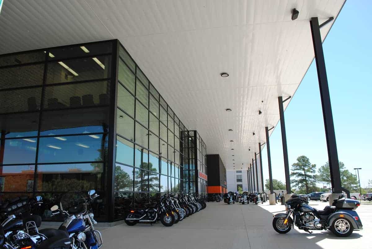 Motorcycles parked outside modern building