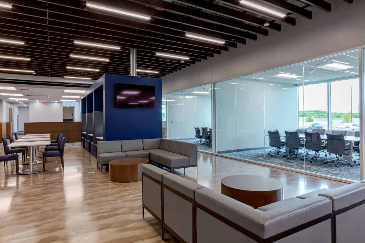 Modern office lobby with conference room view.