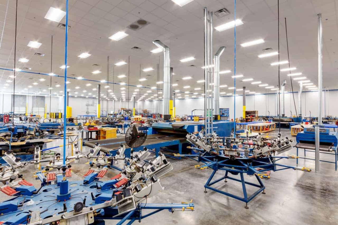 Spacious modern manufacturing facility with equipment.