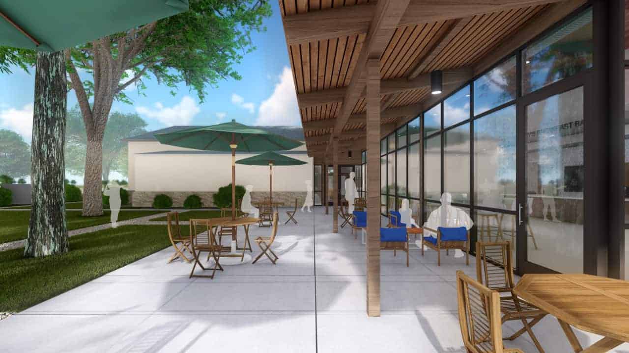 Outdoor patio with tables and umbrellas