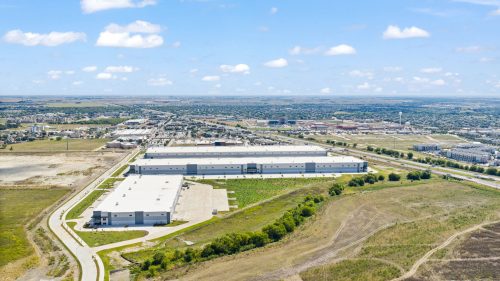 Aerial view of large industrial warehouses complex