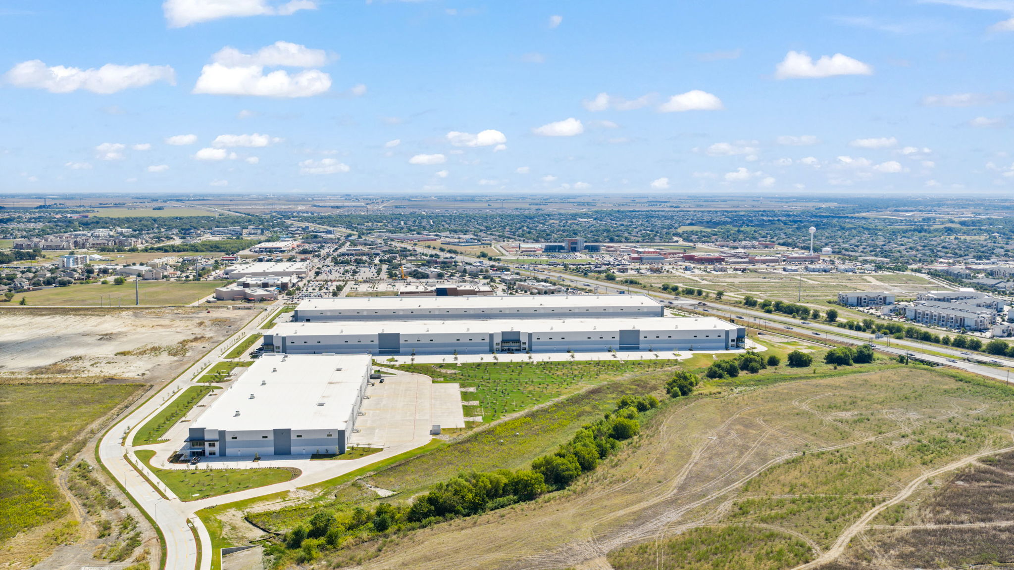 Aerial view of large industrial warehouses complex
