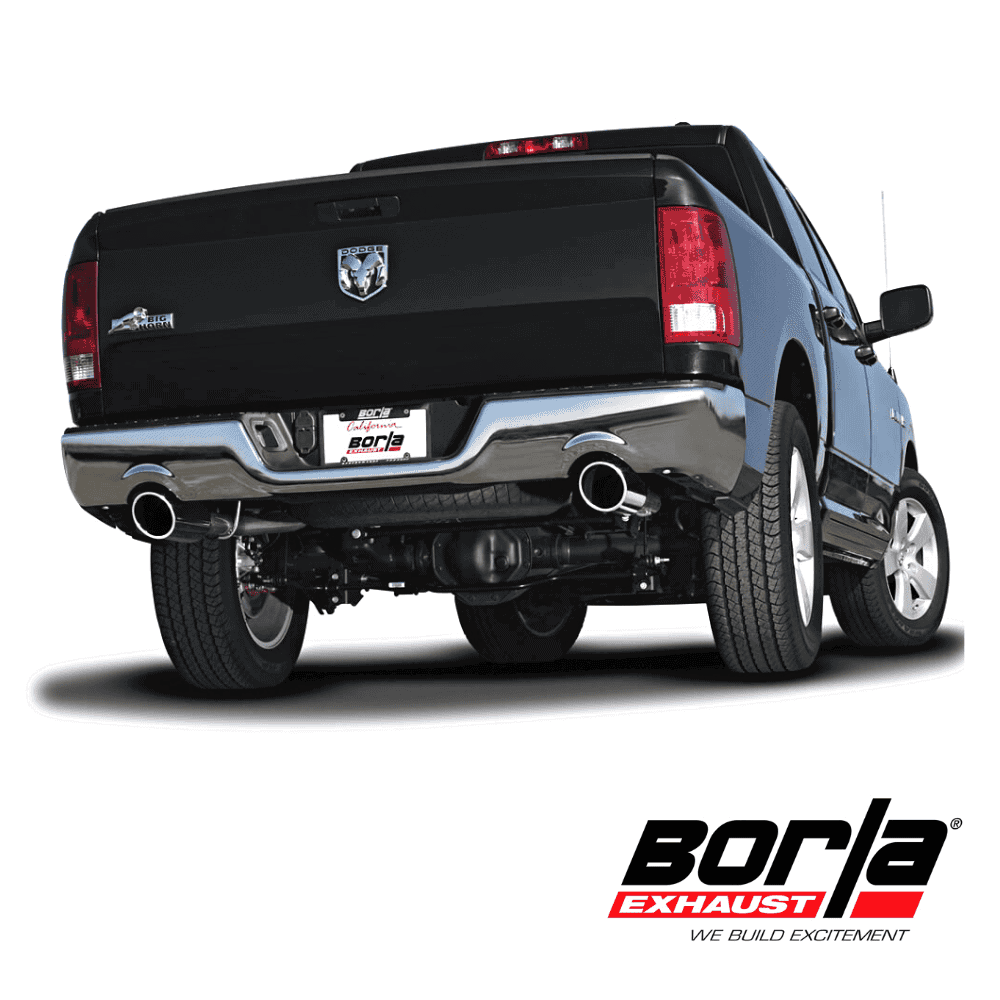 Black pickup truck with Borla exhaust system, rear view, on a white background.