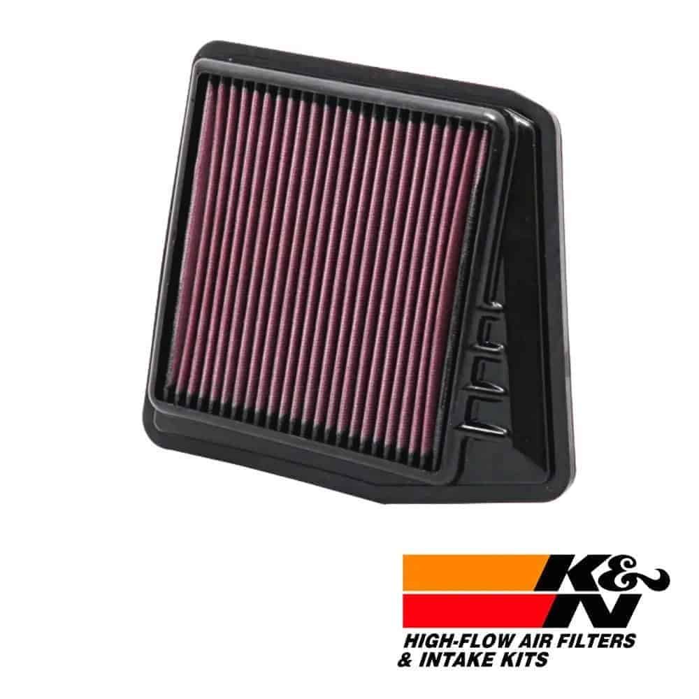 High-flow air filter for vehicle engine, K&N branded, with intake kit, black frame, and pink filter.