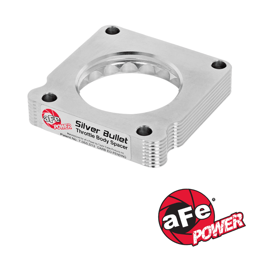 High-performance Silver Bullet throttle body spacer for automotive enhancement and engine efficiency.