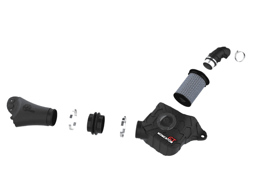 Disassembled automotive air filter housing and components on a white background.