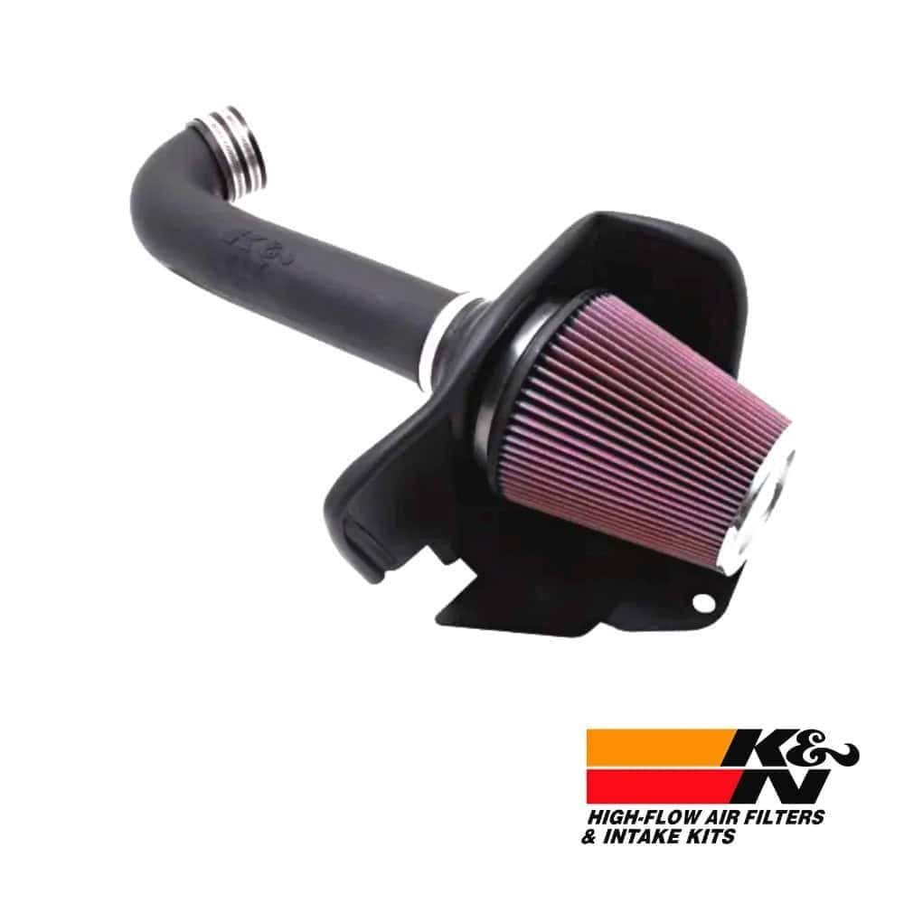 High-flow air filter and intake kit for vehicle performance enhancement.