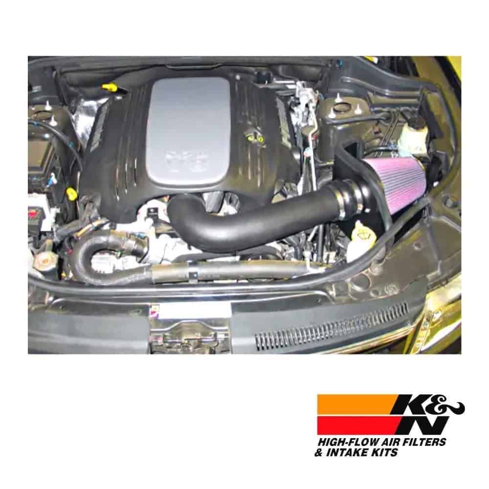 High-flow air filters and intake kits installed in a car engine for improved performance and airflow.