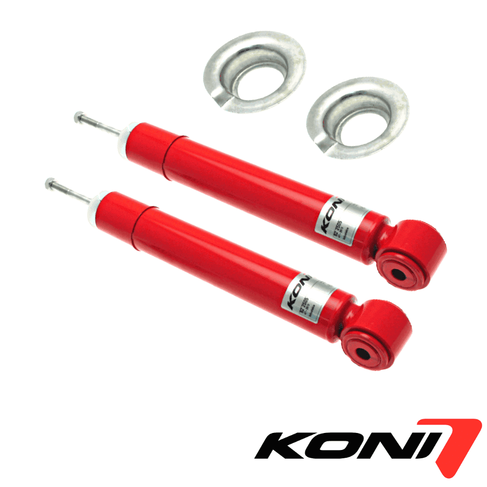 Red shock absorbers with mounting hardware for vehicle suspension systems.
