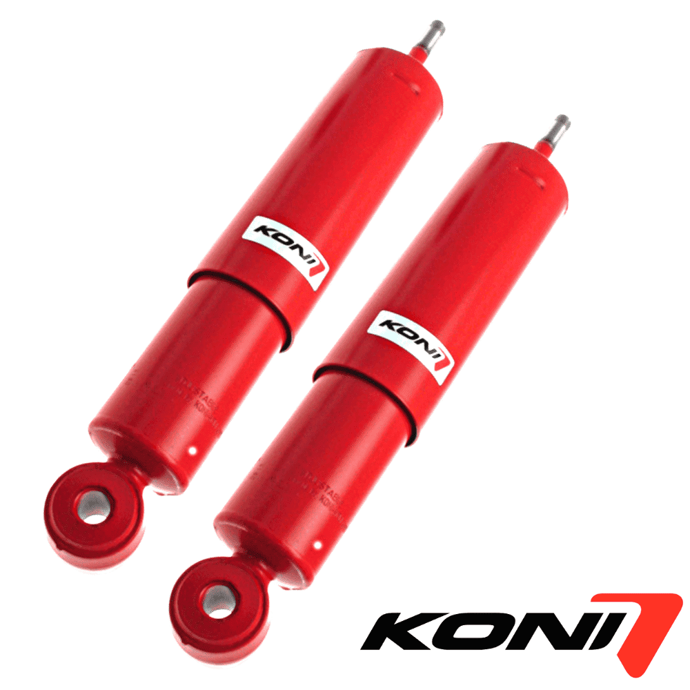 Red KONI shock absorbers for vehicle suspension systems.