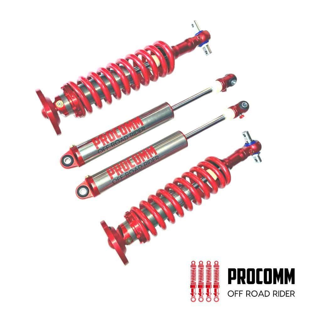 High-performance red off-road shock absorbers for rugged vehicle suspension systems.