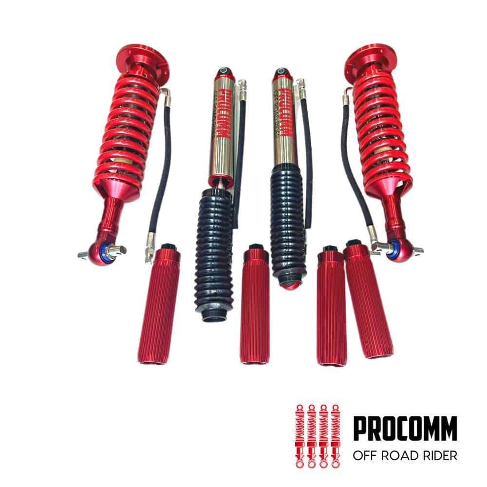 High-performance red off-road shock absorbers for rugged vehicle suspension systems.
