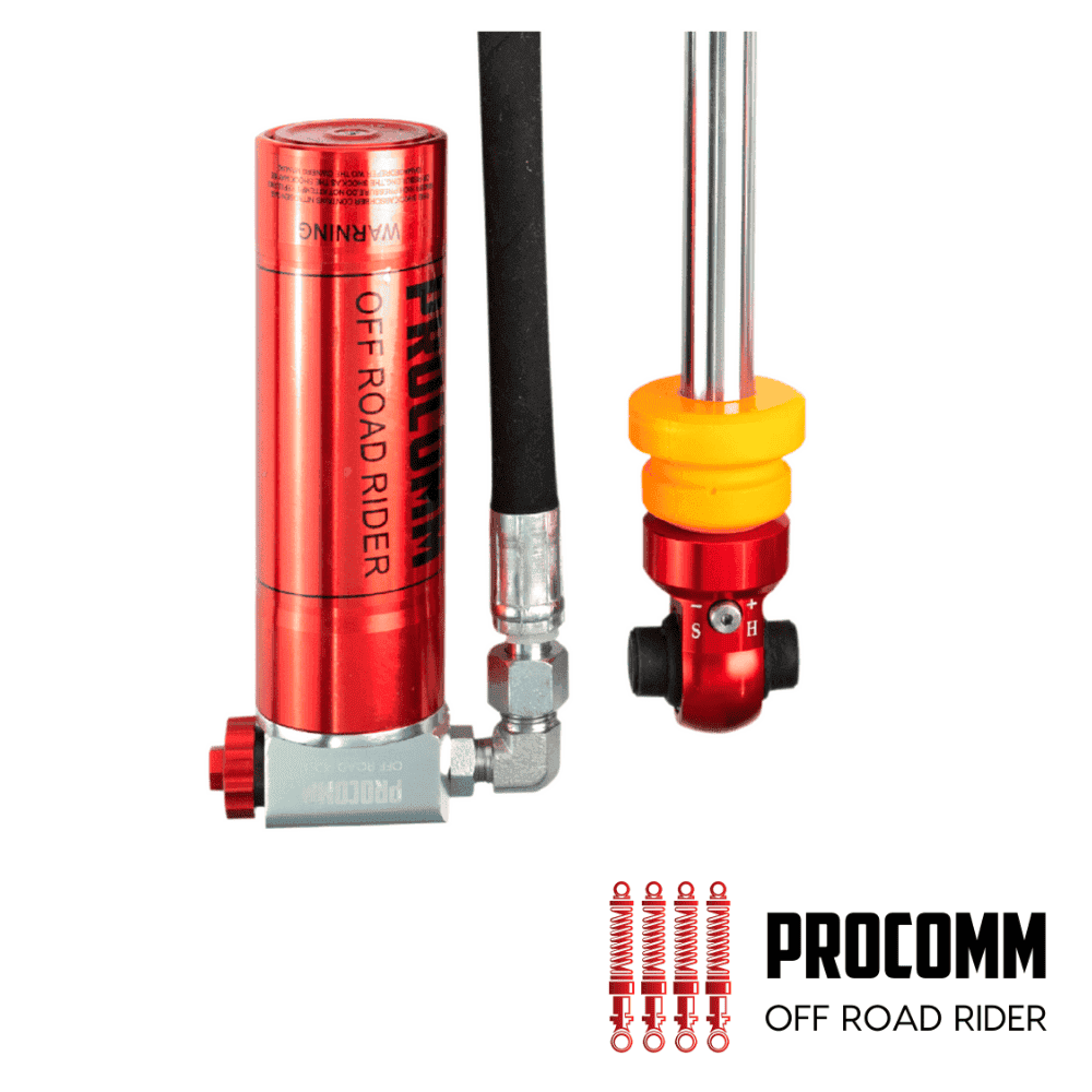 Red PROCOMM off-road rider shock absorber with mounting hardware and logo.