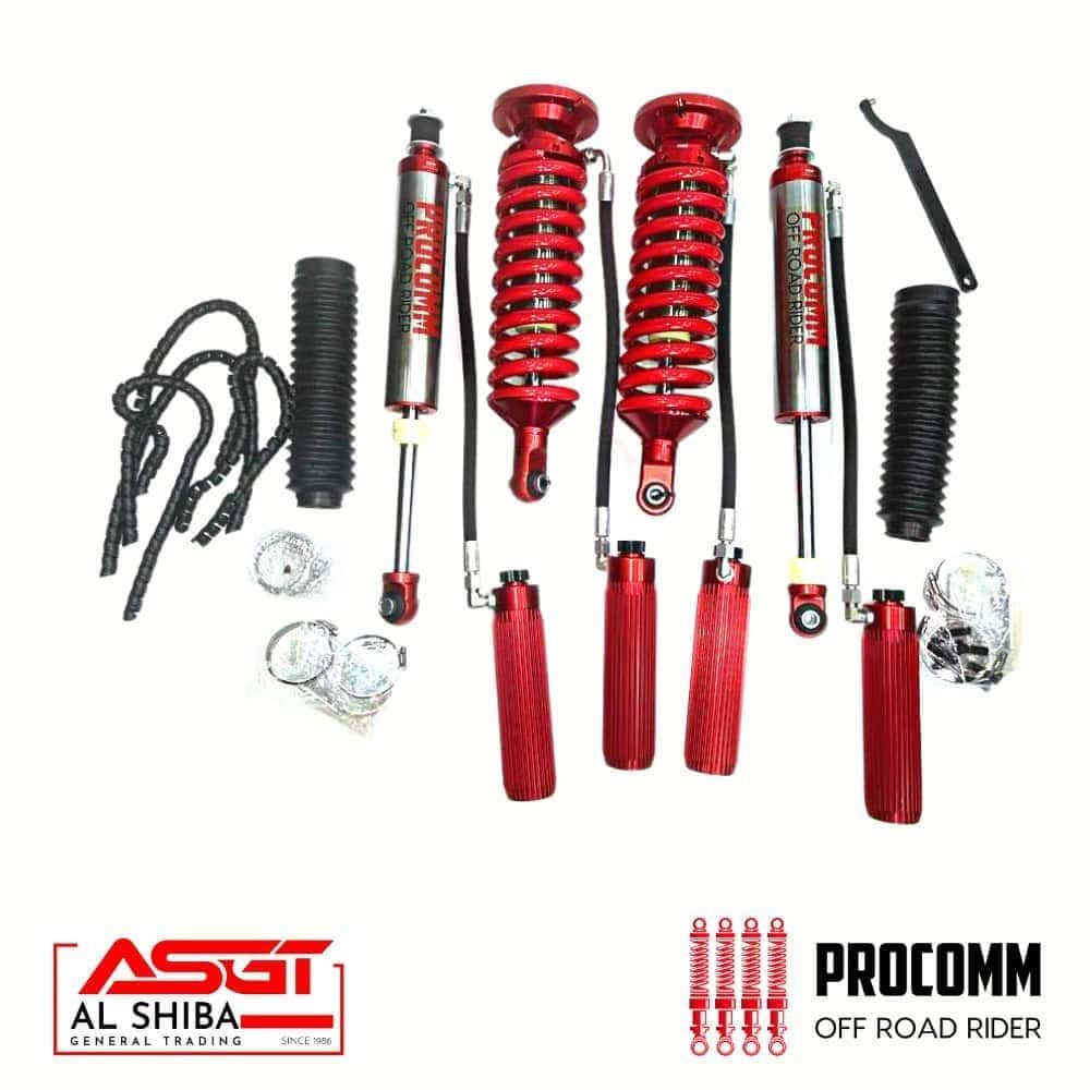 High-performance red off-road shock absorbers and suspension components for rugged vehicle handling.