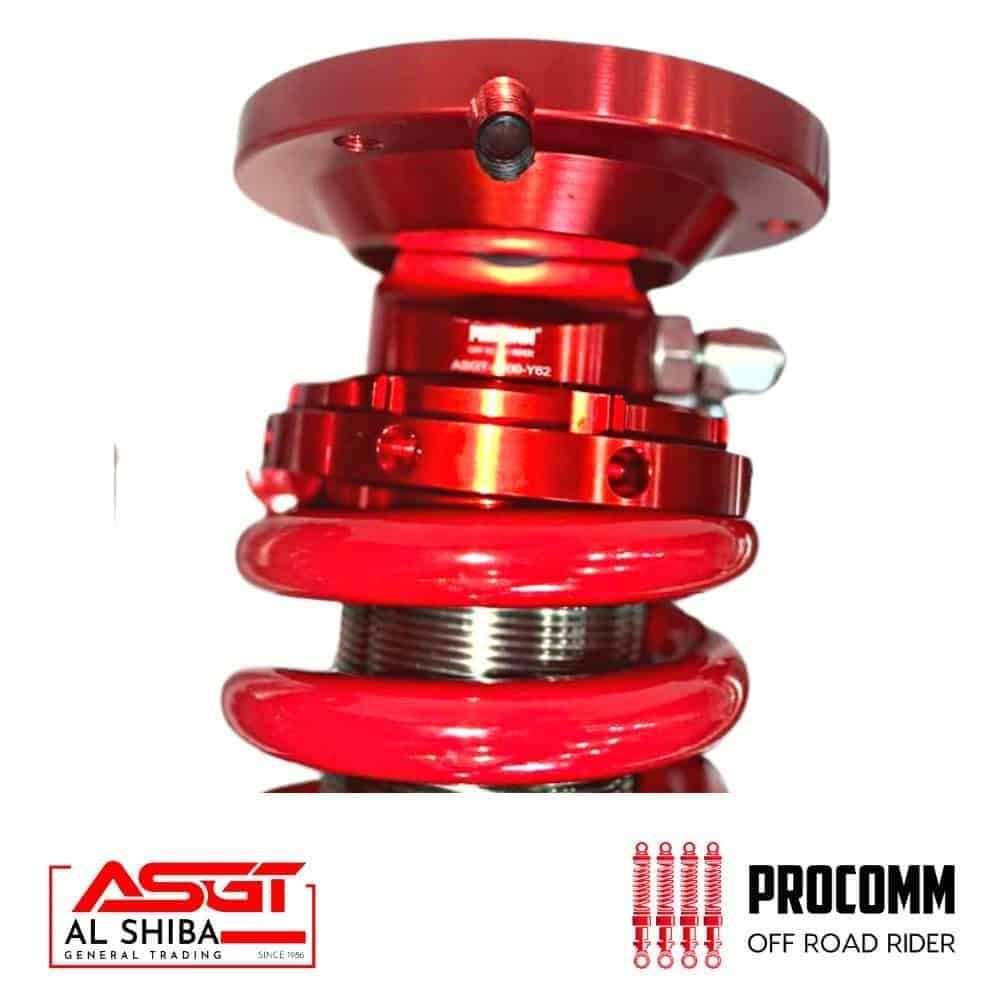 Red off-road motorcycle shock absorber for durable suspension.
