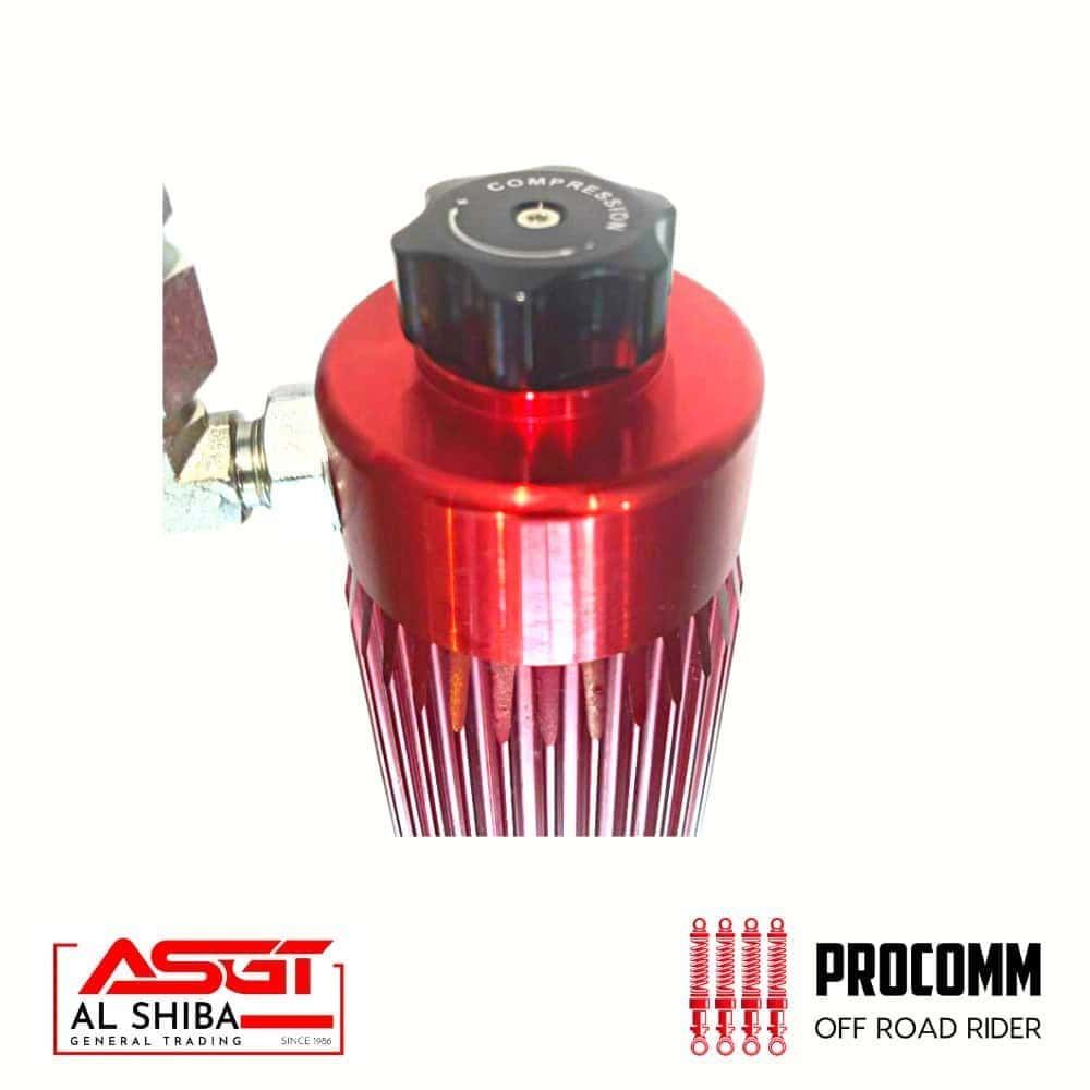 High-performance red off-road motorcycle oil filter with Procomm branding.