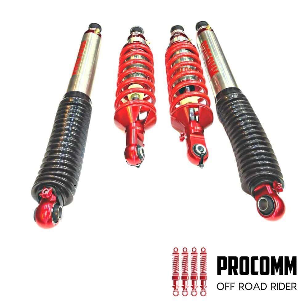 High-quality red and black shock absorbers for off-road vehicles by Al Shiba General Trading. Durabl.