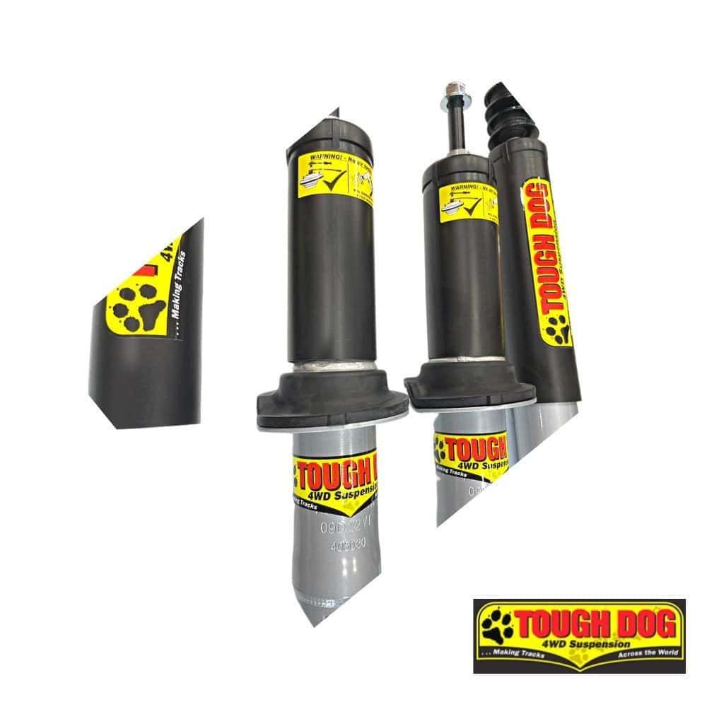 Heavy-duty 4WD suspension shock absorbers with Tough Dog branding for off-road vehicles.