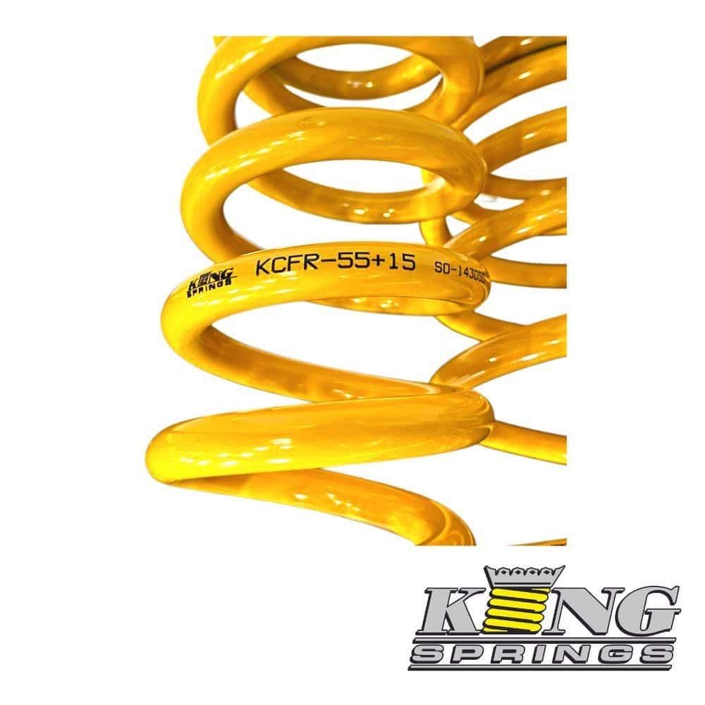 High-quality yellow coil spring for automotive suspension systems.