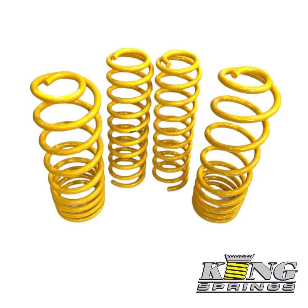 Yellow coil springs for industrial or automotive use, high-quality and durable.