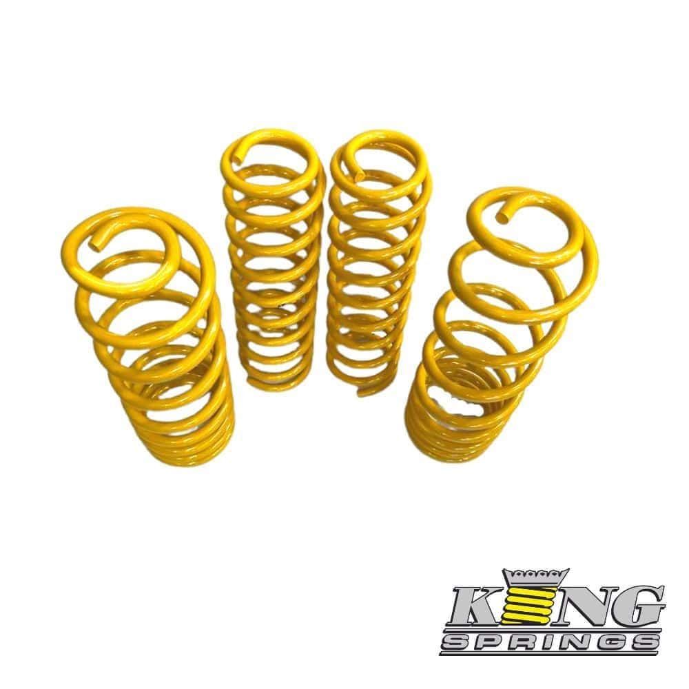 Yellow coil springs for industrial or automotive use, high-quality springs from Al Shiba General Tra.